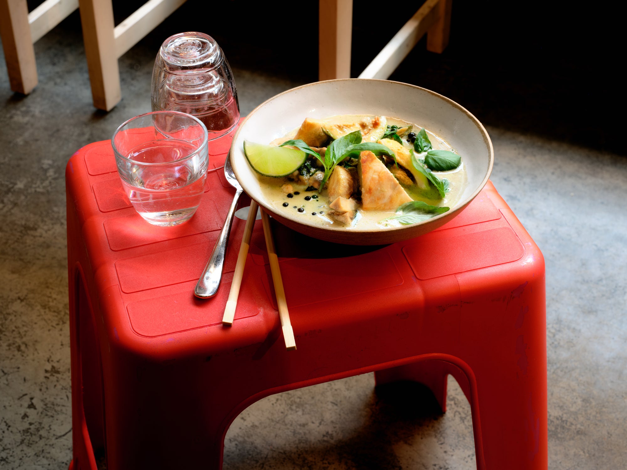 A green curry bowl made with a Wild Rice sauce
